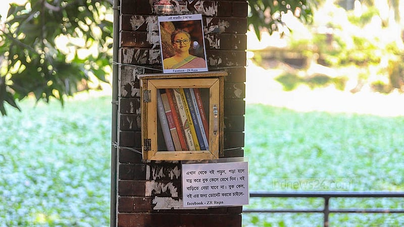 JR Rupa launched the Dhanmondi Lake bookcase project on Nov 16, 2024, with just five books in one case. Thanks to community support, the lake now features 10 bookcases. Photo: Abdullah al Momin