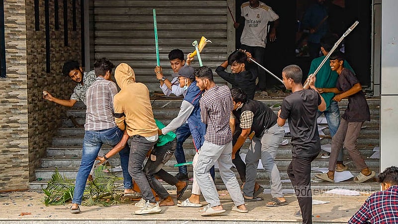 Two rival groups clash during an attack at Dr Mahbubur Rahman Mollah College in Dhaka’s Jatrabari. Photo: Mahmud Zaman Ovi