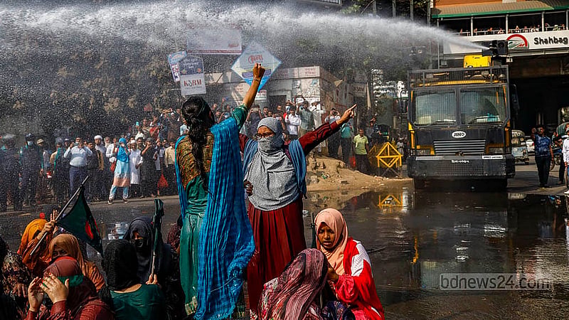 Some of those protesting the cancellation of appointment of assistant teachers to primary schools fell ill after police blasted water canons at them to disperse the demonstrators who took position to block Shahbagh Intersection on Thursday, Feb 13, 2025. Photo: Mahmud Zaman Ovi