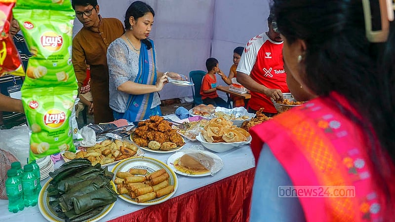 Stalls set up at the Wangala festival premises on Friday, Oct 24, 2025, sold food products at the Banani Bidyaniketan School and College grounds in Dhaka. Photo: Abdullah al Momin