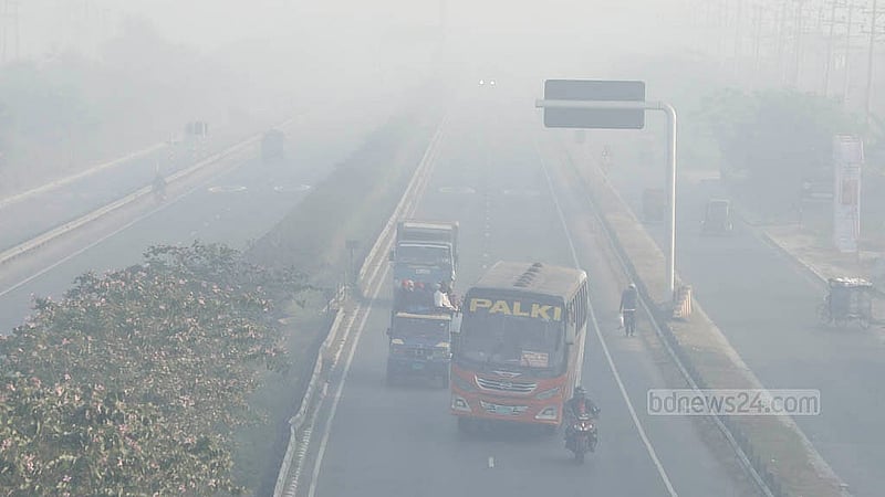 Several vehicles, including motorcycles, speed through the fog in the Abdullahpur area of the Dhaka–Mawa Expressway. Photo: Abdullah Al Momin