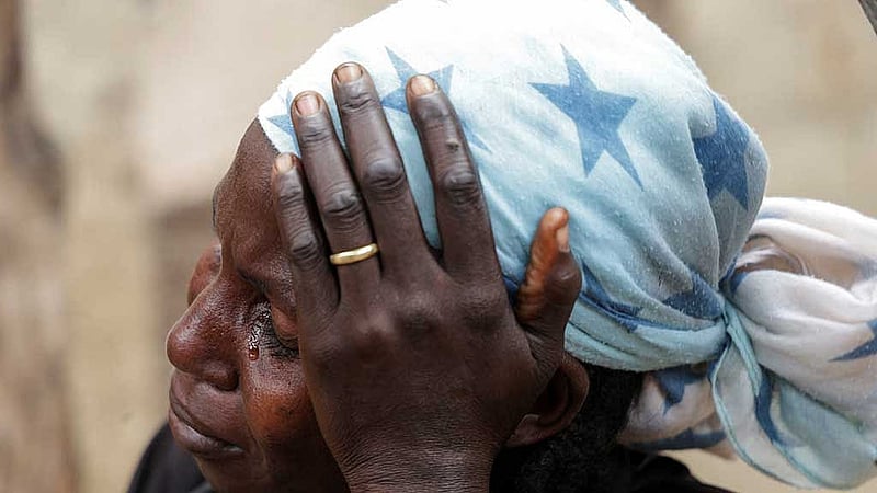 Djidja Hamidou, mother of a five-month-old child who died of malaria in July 2025, reacts while talking about the death of her child, in Kalliao, Cameroon Sept 3, 2025. REUTERS/Desire Danga Essigue