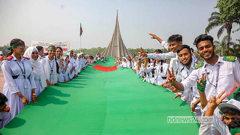 Students carrying the national flag arrive at the National Memorial in Savar on Thursday, Mar 26, 2026, to commemorate Independence Day.