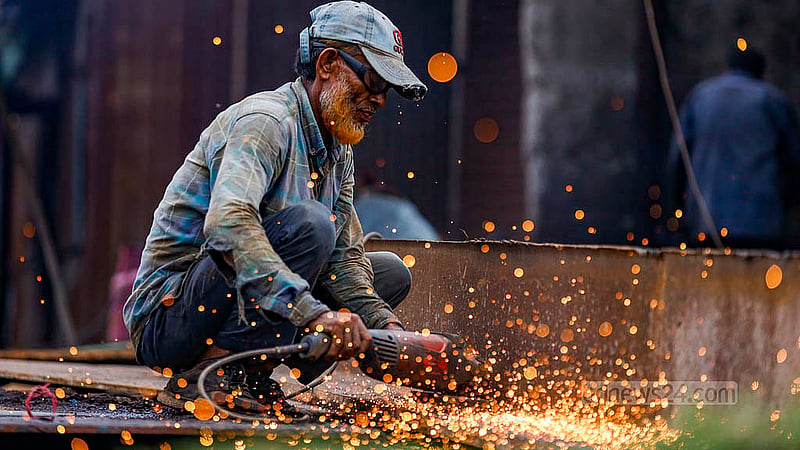 Day labourers often do not know about the May Day public holiday. They work over 10 hours a day to earn around Tk 12,000 a month. They have to keep working on the holiday to try and eke out a living. Photo: Mahmud Zaman Ovi