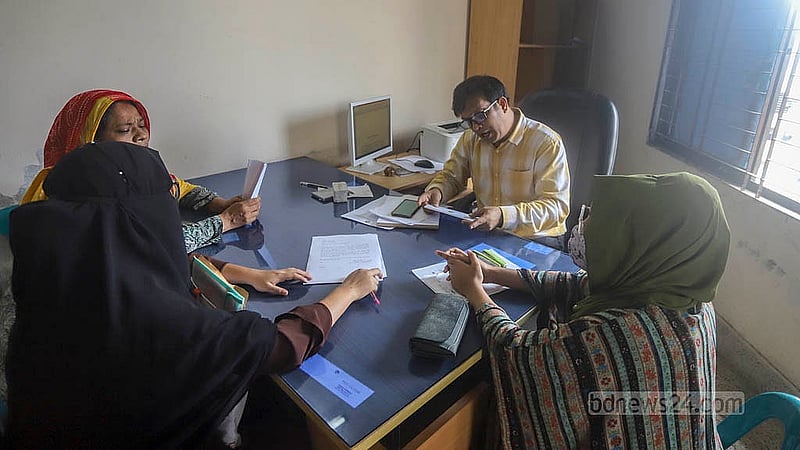 Ward secretary Moniruzzaman, who gave a single name, is busy with various tasks at the office of Chandan Kotha Cultural Centre in South Jatrabari at Ward No. 50 of Dhaka South City Corporation, or DSCC. He is in charge of Ward No. 50 and 40. Photo: Abdullah al Momin