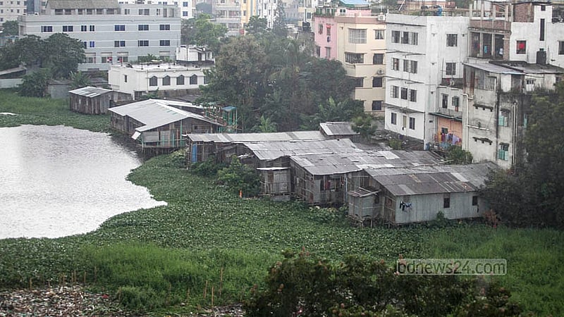 Tin-shed houses have been erected by encroaching on the banks of Chowdhurypara lake. In 2015, a two-storey structure built over the lake collapsed, killing 12 people. Saturday, Sept 13. Abdullah Al Momin