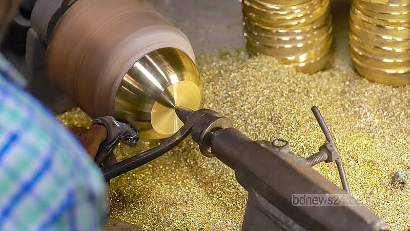 Craftsmen polish up brass utensils one last time at a brass factory in Jhaulahati in Dhaka’s Kamrangirchar. Photos: Abdullah Al Momin