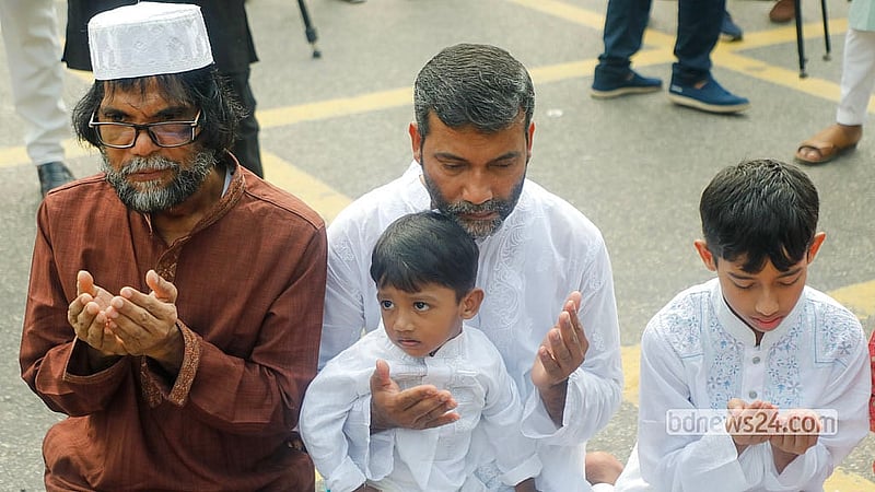 After the Eid-ul-Azha prayers at the National Eidgah grounds on Thursday, May 28, 2026, Muslim devotees prayed together for the well-being of the country and the nation. Photo: Abdullah Al Momin