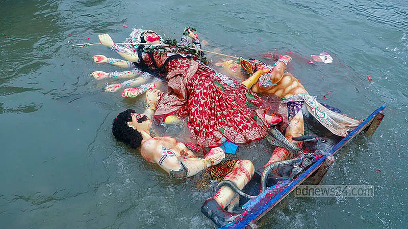 Hindus bid farewell to the Goddess Durga, destroyer of misery, by immersing idols in the Buriganga River at Dhaka’s Waizghat on Thursday, Oct 2, 2025, marking another year of waiting until her return. Photo: Abdullah Al Momin