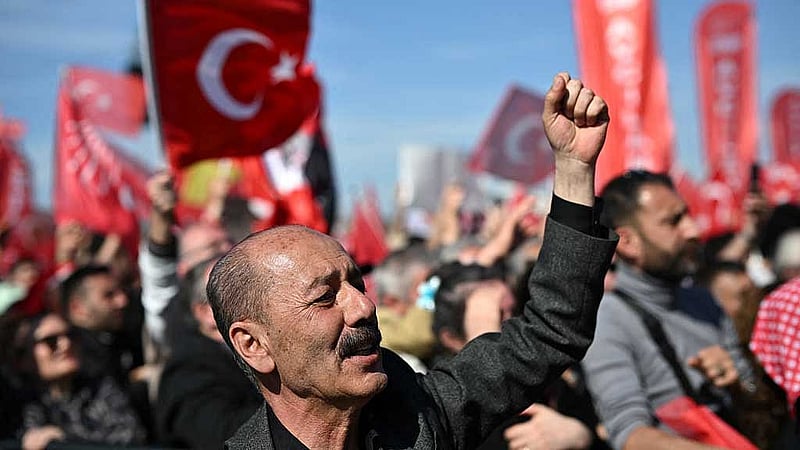 A man takes part in a rally to protest against the arrest of Istanbul Mayor Ekrem Imamoglu as part of a corruption investigation, in Istanbul, Turkey, March 29, 2025. REUTERS
