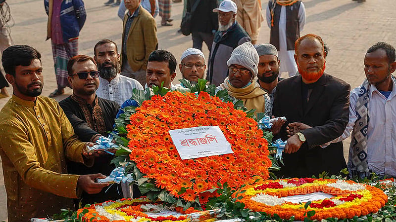 The Department of Archaeology pays their respects to the nation’s heroes at the Rayer Bazaar Massacre Memorial on Martyred Intellectuals Day. Photo: Mahmud Zaman Ovi