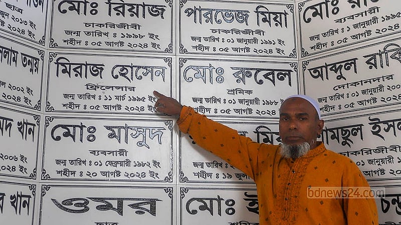 Miraz Hossain was shot dead by police outside the Jatrabari Police Station during the Anti-discrimination Student Movement on Aug 5. The victim’s father showing his son’s name inscribed on the “Shahidi Oikya Chattar” memorial. Photo: Abdullah al Momin