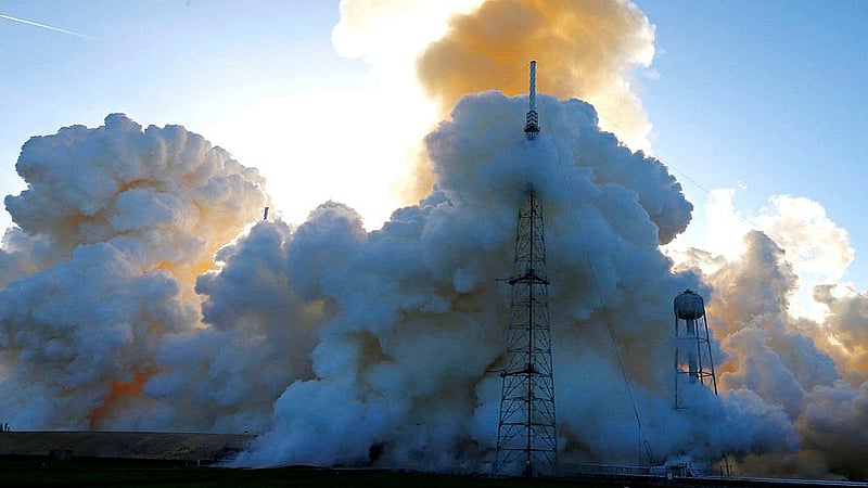 Smoke shrouds a lightning suppression tower after the launch of NASA's Artemis II mission to fly by the moon, at the Kennedy Space Center in Cape Canaveral, Florida, U.S., April 1, 2026. Photo: Reuters