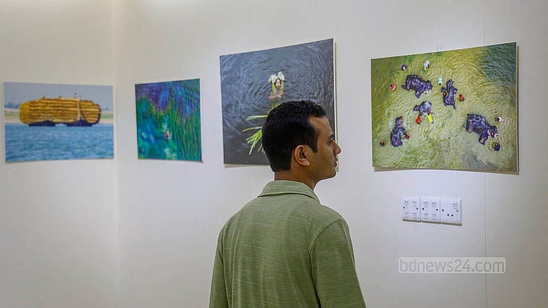 Visitors tour the photography exhibition titled “Love and Life Through My Eyes” at Dhaka’s Bishwo Shahitto Kendro (BSK). Photo: Mahmud Zaman Ovi