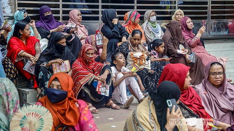 Parents wait outside the exam halls as candidates take the SSC exam on Tuesday, Apr 21, 2026.  Photo: Abdullah Al Momin