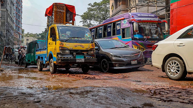 The road to Hanif Flyover via Tikatuli in Dhaka is in such bad condition that even private car and bus drivers struggle to drive on it. Photo: Mahmud Zaman Ovi