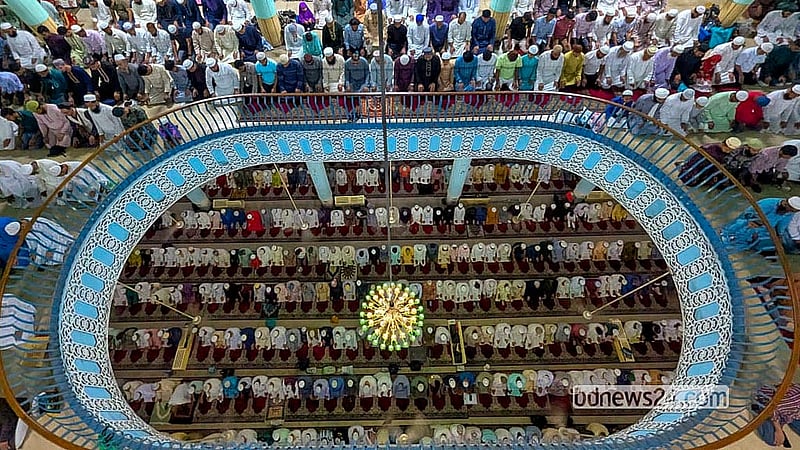 Devotees attend the first Eid-ul-Fitr congregation at Baitul Mukarram National Mosque on Saturday morning. Photo: Abdullah Al Momin