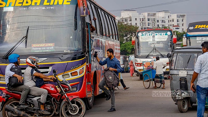 Bus operators take passengers just after leaving Mohakhali terminal in Dhaka, although they agreed not to stop anywhere other than designated spots.