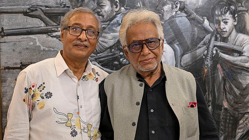 Internationally acclaimed painter Monirul Islam and Ekushey Padak-winning photographer Nasir Ali Mamun at the event.