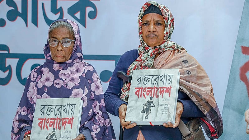 Guests, including Liberation War heroines Sheikh Fatema Ali and Firoza Begum, pose with the book alongside bdnews24.com Editor-in-Chief Toufique Imrose Khalidi, the editor of the anthology, after its launch on Tuesday, Dec 16, 2025.
