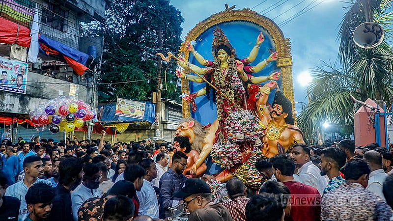 Idols are brought from different places in Dhaka to the banks of the Buriganga River in Dhaka's Waizghat for immersion on Thursday, Oct 2, 2025. Photo: Abdullah Al Momin