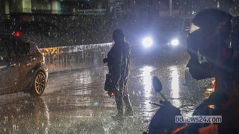 After enduring intense heat for days in the Bengali summer month of Baishakh, Dhaka residents get some respite from the rain on Sunday, Apr 26, 2026, though those outdoors face disruption due to wind and rain. Photo: Abdullah Al Momin