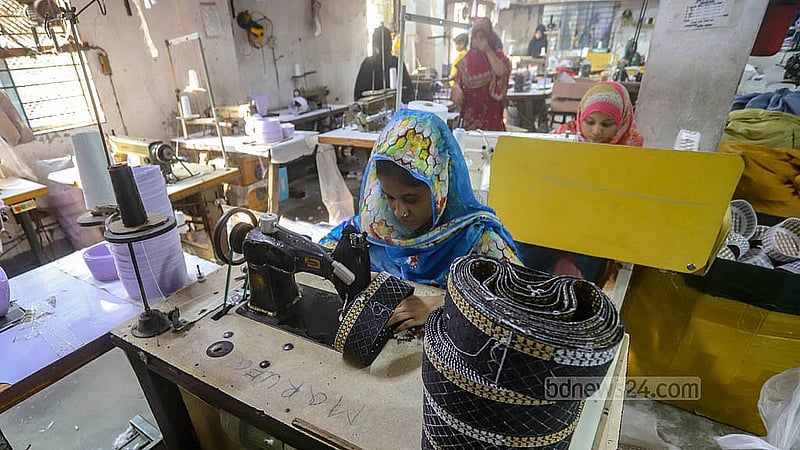 Craftsmen at a skull cap factory in Kamrangirchar are busy ahead of Eid-ul-Fit. Photo: Abdullah al Momin