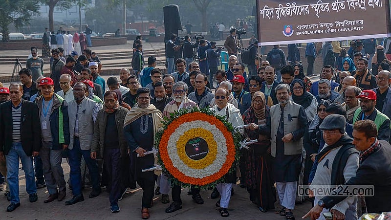 Bangladesh Open University, or BOU, pays respect at the Rayer Bazaar Massacre Memorial on Martyred Intellectuals Day. Photo: Mahmud Zaman Ovi