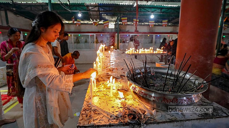 Buddhists celebrate their largest festival Buddha Purnima by lighting candles at Dharmarajik Buddhist Mahavihara in Dhaka’s Sabujbagh on Wednesday, May 22, 2024. Photo: Mahmud Zaman Ovi