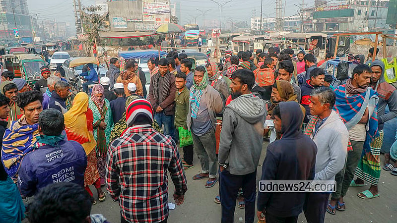 People from different walks of life arrive in groups at the Hemayetpur bus terminal area of Savar before the day breaks, in search of work. Photo: Abdullah Al Momin