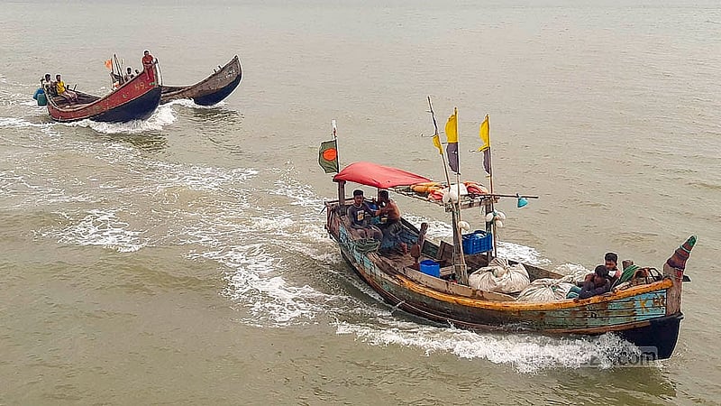 Fishermen from Teknaf’s Shah Porir Dwip take to the sea in their trawler after a 58-day ban on fishing. Photo: Jashim Mahmud