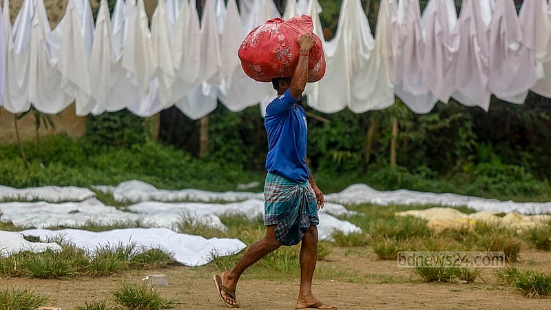 The rooms of the temporary court set up in the Alia madrasa field in Old Dhaka’s Bakshibazar have been closed since January. Washed clothes from decoration companies are now being dried in the empty field outside the court. Photo: Mahmud Zaman Ovi