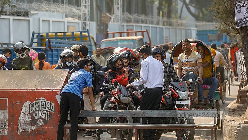 Technical students block the Saat Rasta area of Dhaka’s Tejgaon, Dhaka, on Tuesday, Feb 3, 2026, halting all vehicular movement as they protest a recommendation to appoint BSc engineers alongside diploma engineers to assistant engineer posts. Photo: Mahmud Zaman Ovi