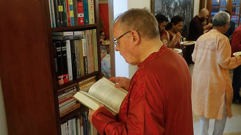Julian Francis browses books during bdnews24.com’s Bengali New Year celebration.