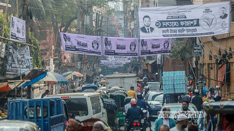Alauddin Road in Old Dhaka is plastered with cloth banners ahead of the national election. Photo: Abdullah Al Momin