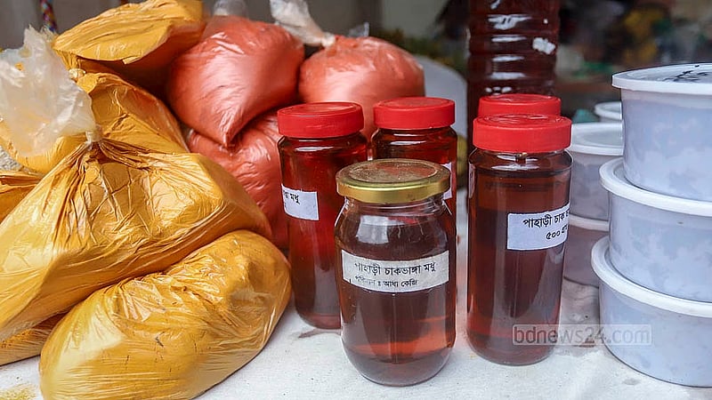 Along with fruits, other hill-grown products are also on offer at the fair. Photo: Abdullah al Momin