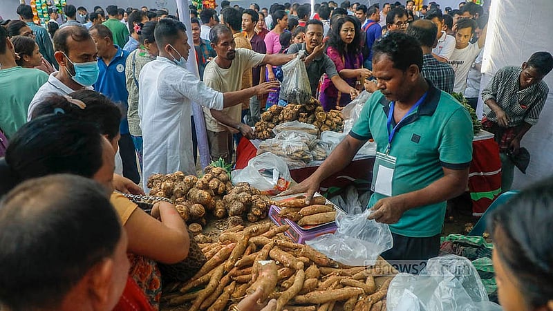 Stalls set up at the Wangala festival premises on Friday, Oct 24, 2025, sold food products at the Banani Bidyaniketan School and College grounds in Dhaka. Photo: Abdullah al Momin