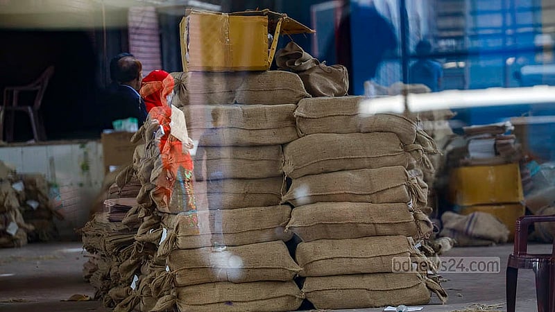 Sacks filled with referendum ballot papers are stacked inside the auditorium of the Willes Little Flower School and College polling centre. Trucks are transporting the ballots to assistant returning officers across Dhaka constituencies on Sunday, Feb 8, 2026. Photo: Mahmud Zaman Ovi