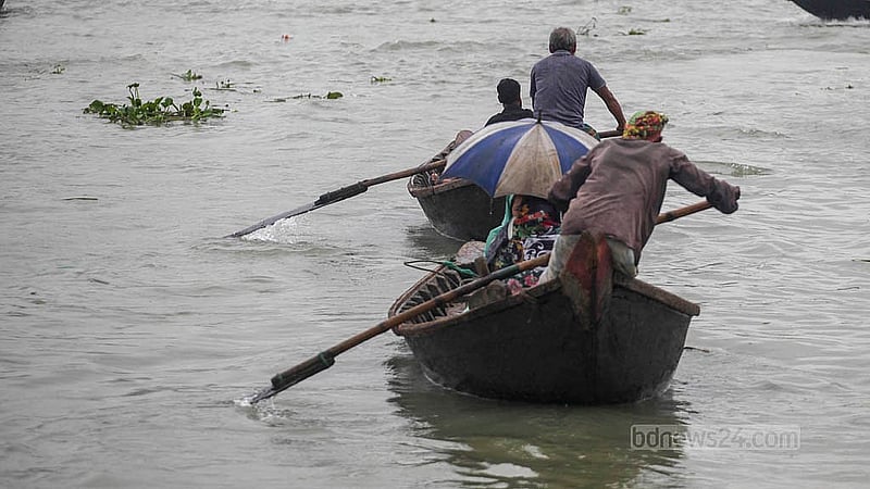 The Buriganga is filled with rainwater on Saturday, Aug 23, 2025, making boating more comfortable than before. However, when the water level drops, people must cross the river while covering their noses due to the foul smell from pollution. Photo: Abdullah Al Momin