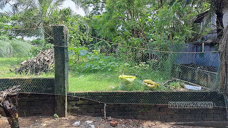 Encroachers have built a brick wall directly over the cremation ground.