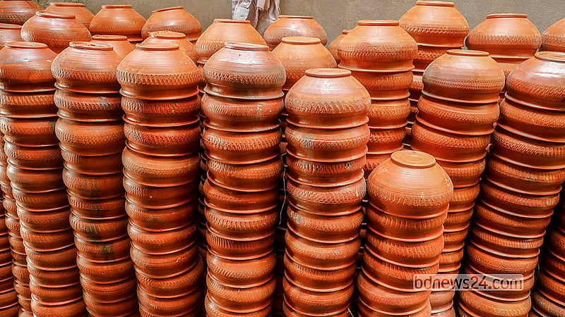 Clay pots of various sizes are stored in a godown in the capital’s Milbarrack area. The pots have been brought from different parts of the country and kept there for distribution. Photo: Abdullah Al Momin