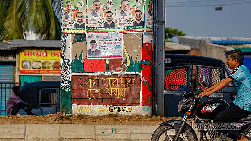 Graffiti drawn by students added a unique dimension to the July Uprising. Those pieces are now being obscured by posters and banners for politicians and products. Photo: Mahmud Zaman Ovi