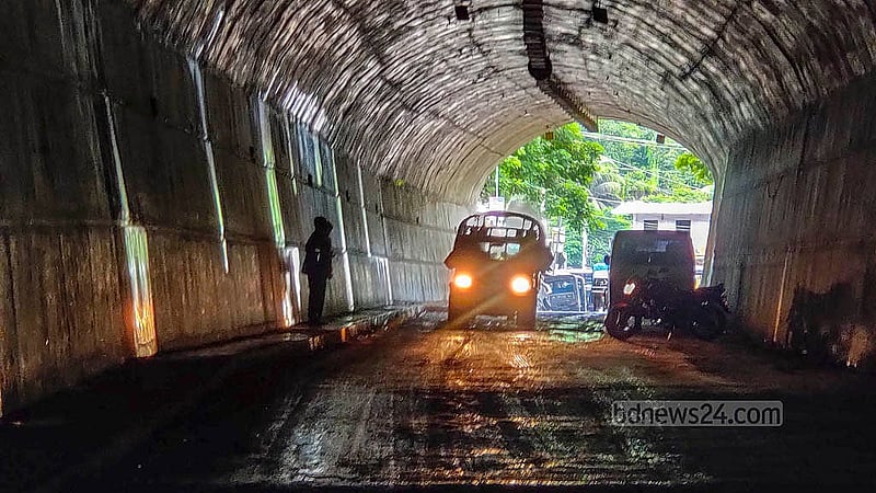 Water dripping from the walls of the Bandarban Bus Terminal Tunnel has created potholes, leaving the interior muddy. Both people and vehicles still struggle to pass through it. Photo: U She Thowai Marma