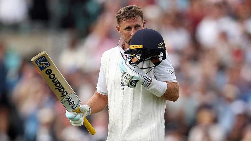 Fifth Test - England v India - Kia Oval, London, Britain - Aug 3, 2025 England's Joe Root kisses his helmet as he celebrates after reaching his century Action Images via Reuters/Paul Childs