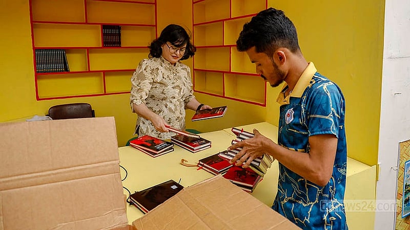 Books begin to fill the shelves of stalls at the fairgrounds in Suhrawardy Udyan as the Amar Ekushey Book Fair prepares to open for an 18-day run this year. Photo: Mahmud Zaman Ovi