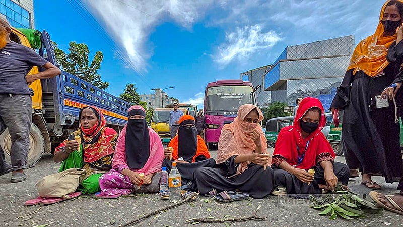 Female garment workers stage sit-in protests in Dhaka’s Kuril on Wednesday, Sept 3, 2025, to demand the payment of wages and benefits.