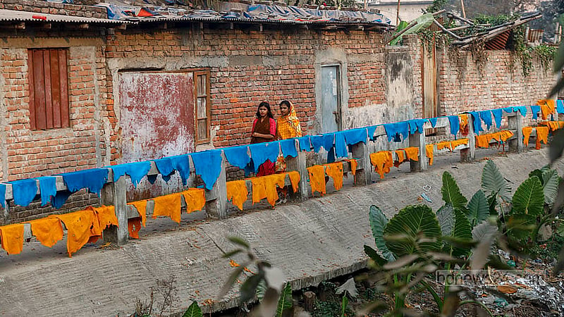 Processed leather of multiple colours is being dried on roadside railings along the canal in Hazaribagh’s Kalunagar. Photo: Mahmud Zaman Ovi