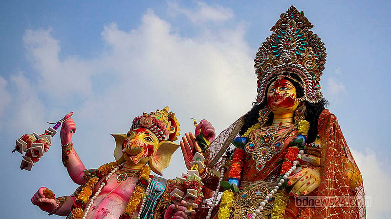 Hindu devotees bid farewell to Goddess Durga through idol immersion at Buriganga River in Dhaka’s Bosila on Sunday, Oct 13, 2024. Photo: Shamim-Us-Salehin