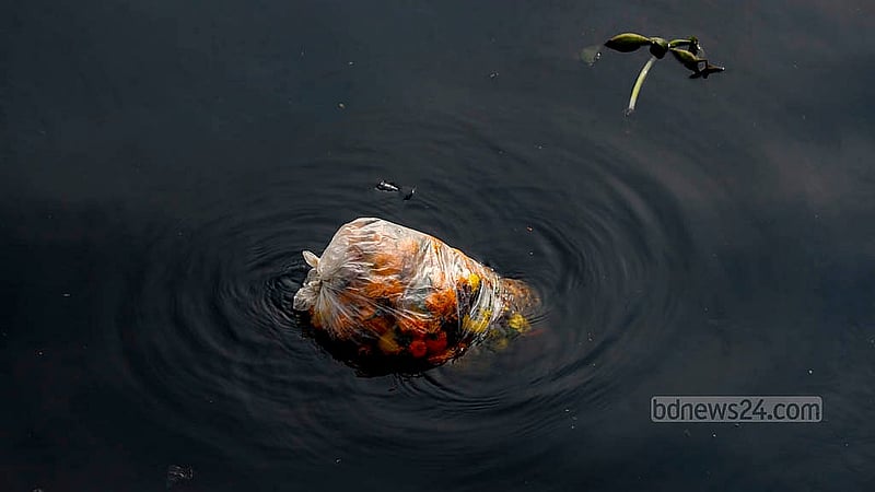 Every day, different waste materials can be seen floating in the pitch black water of the Buriganga River. Photo: Mahmud Zaman Ovi