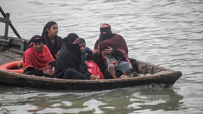 The Buriganga is filled with rainwater on Saturday, Aug 23, 2025, making boating more comfortable than before. However, when the water level drops, people must cross the river while covering their noses due to the foul smell from pollution. Photo: Abdullah Al Momin